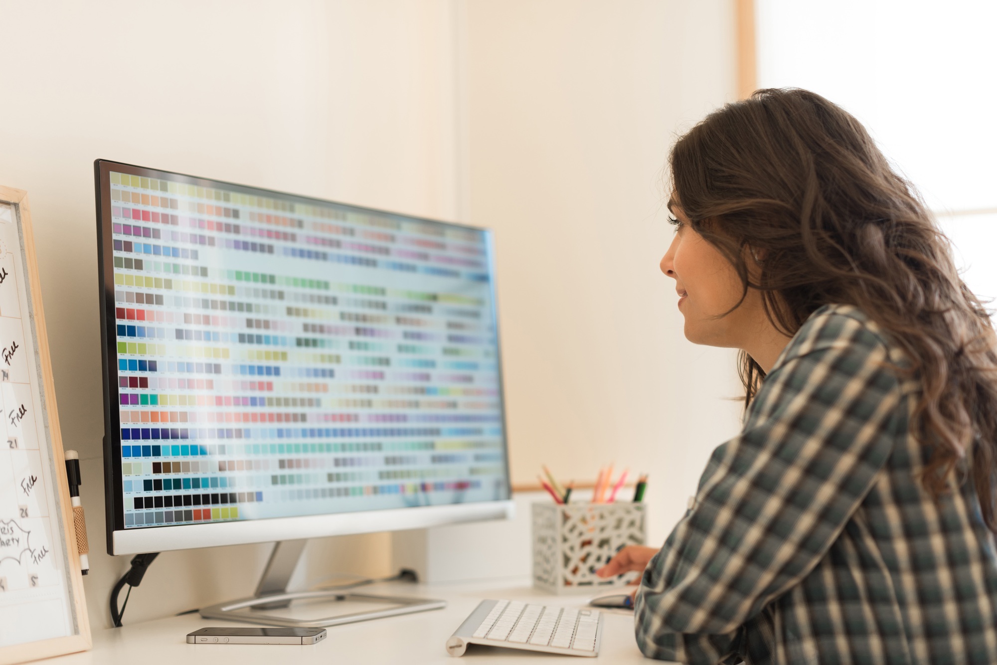 Woman picking colors for design